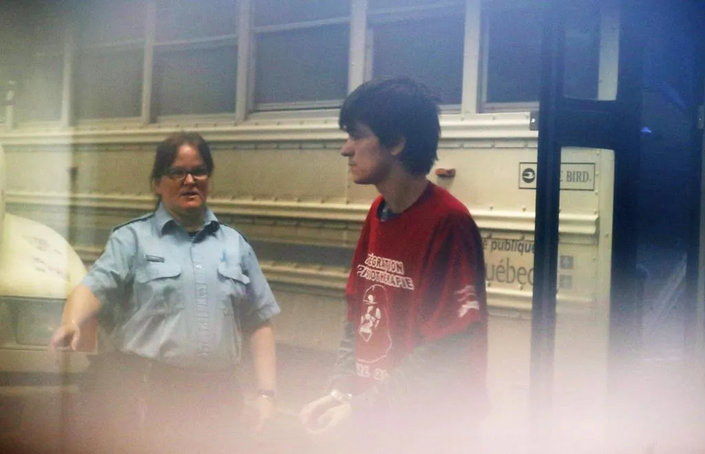 Alexandre Bissonnette arrives at the court house in Quebec City on Feb. 21, 2017. (The Canadian Press/Mathieu Belanger)