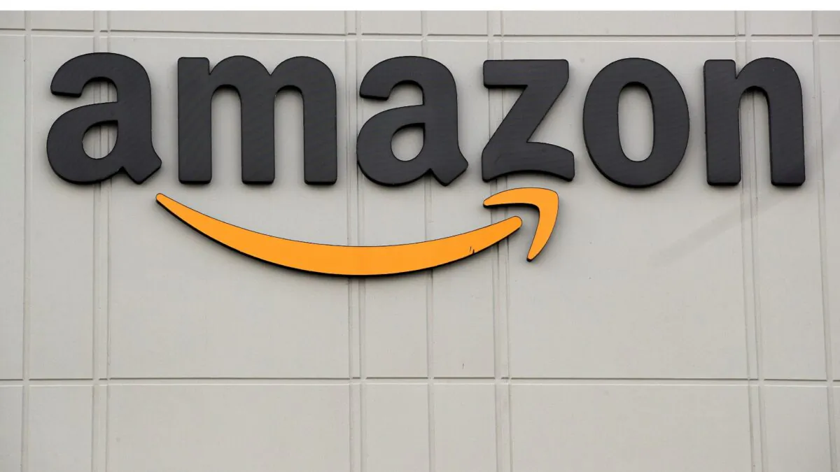 The Amazon logo is pictured outside the company's JFK8 distribution center in Staten Island, N.Y., on Nov. 25, 2020. (Brendan McDermid/Reuters)