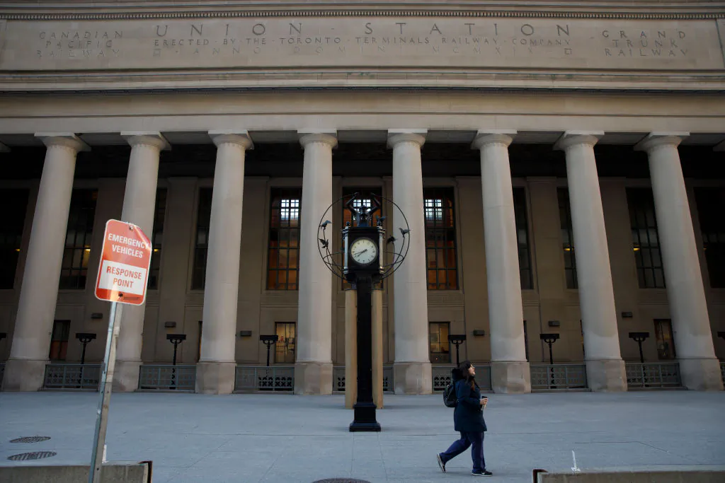 A pedestrian walks by Union Station during morning commuting hours as Toronto copes with a shutdown due to the Coronavirus in Toronto, Canada on April 1, 2020. (Cole Burston/Getty Images)