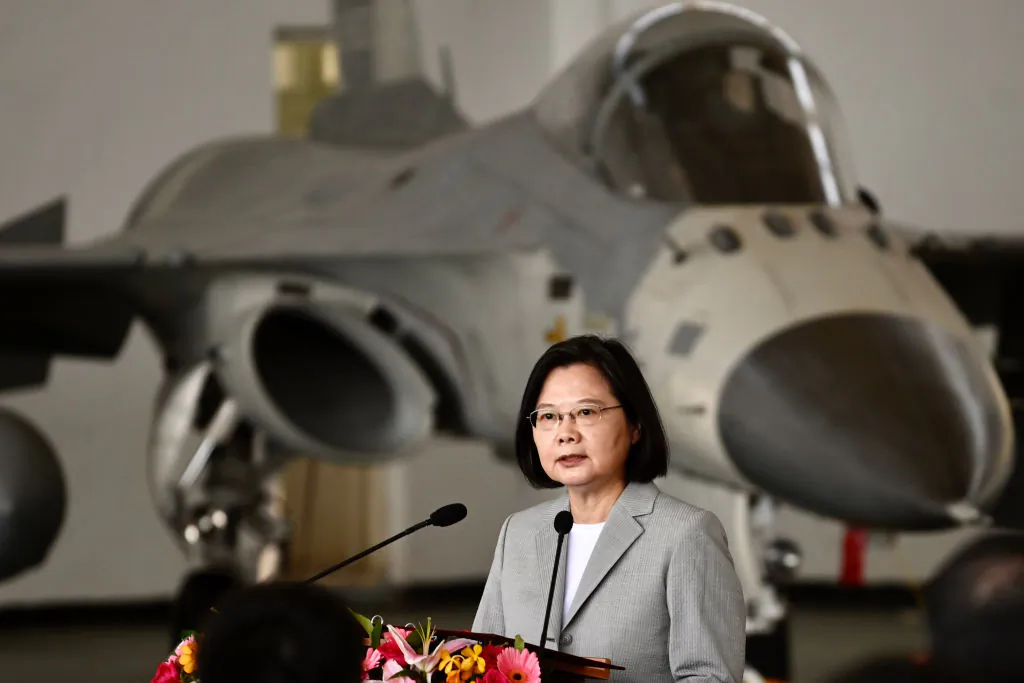 Taiwan's President Tsai Ing-wen speaks in front of a domestically produced F-CK-1 fighter jet in the Penghu islands, Taiwan,  on Sept. 22, 2020. (Sam Yeh/AFP via Getty Images)