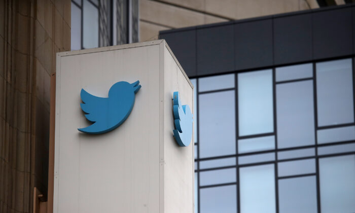 A sign is posted on the exterior of Twitter headquarters in San Francisco, Calif., on July 26, 2018. (Justin Sullivan/Getty Images)