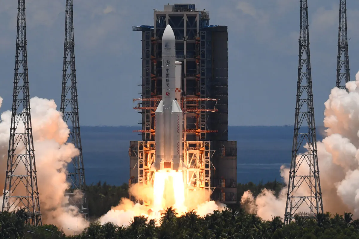 A Long March-5 rocket, carrying an orbiter, lander and rover as part of the Tianwen-1 mission to Mars, lifts off from the Wenchang Spacecraft Launch Center, in China's Hainan Province, on July 23, 2020. (Noel Celis/AFP via Getty Images)