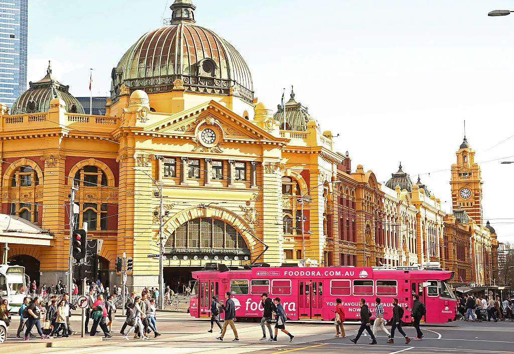 A tram passes in front of Flinders Street Railway Station on August 18, 2016 in Melbourne, Australia.   (Scott Barbour/Getty Images)
