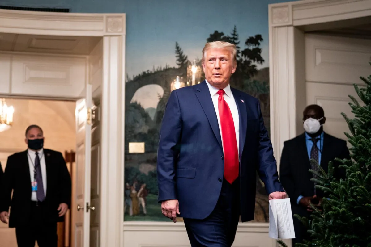 President Donald Trump arrives to speak in the Diplomatic Room of the White House in Washington, on Nov. 26, 2020. (Erin Schaff - Pool/Getty Images)