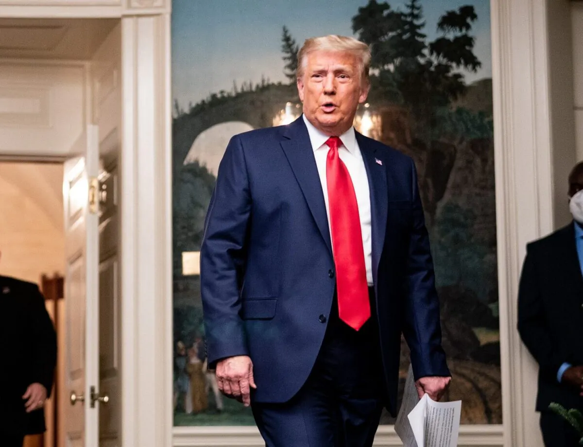 President Donald Trump arrives to speak in the Diplomatic Room of the White House on Nov. 26, 2020. (Erin Schaff/Pool/Getty Images)