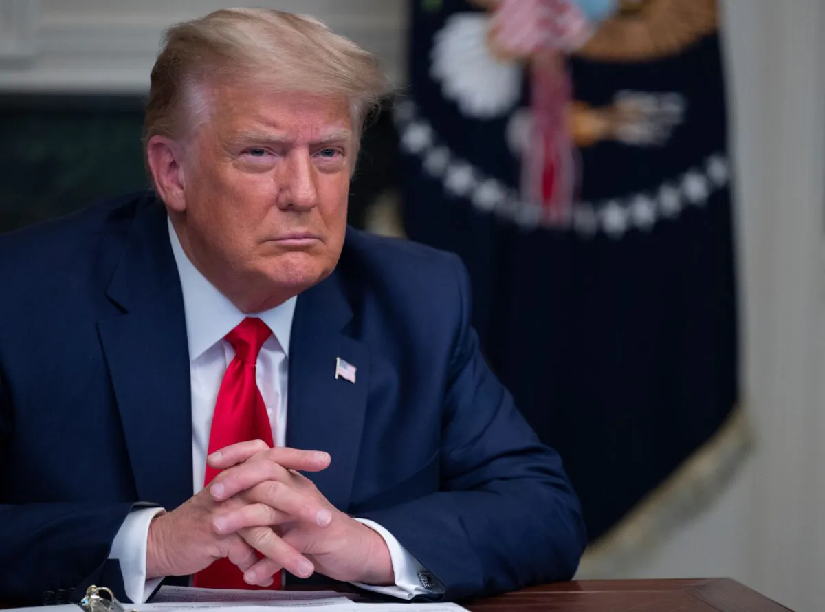 President Donald Trump participates in a Thanksgiving teleconference with members of the United States military, at the White House in Washington on Nov. 26, 2020. (Andrew Caballero-Reynolds/AFP via Getty Images)