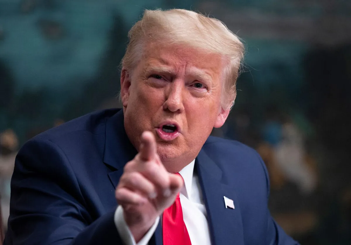 President Donald Trump speaks to reporters after participating in a Thanksgiving teleconference with members of the U.S. military, in the Diplomatic Room of the White House in Washington on Nov. 26, 2020. (Andrew Caballero-Reynolds/AFP via Getty Images)