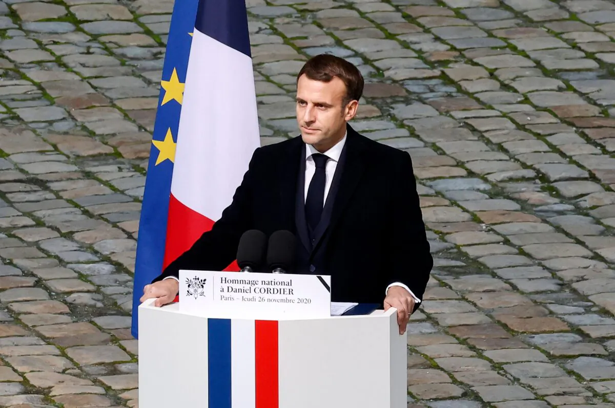 French President Emmanuel Macron delivers a speech during an honorary funeral ceremony for World War II resistant and "Compagnon de la Liberation" Daniel Cordier at the Hotel des Invalides in Paris on Nov. 26, 2020. (Ludovic Marin/AFP via Getty Images)