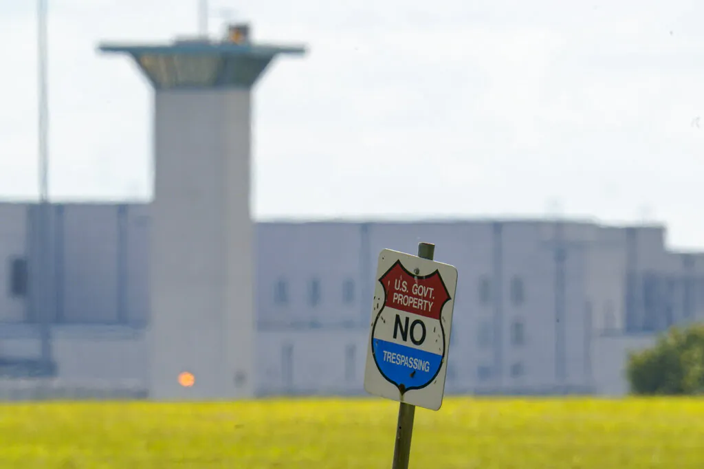 A No Trespassing sign stands in front the federal prison complex in Terre Haute, Ind., on Aug. 26, 2020. (Michael Conroy/AP Photo)