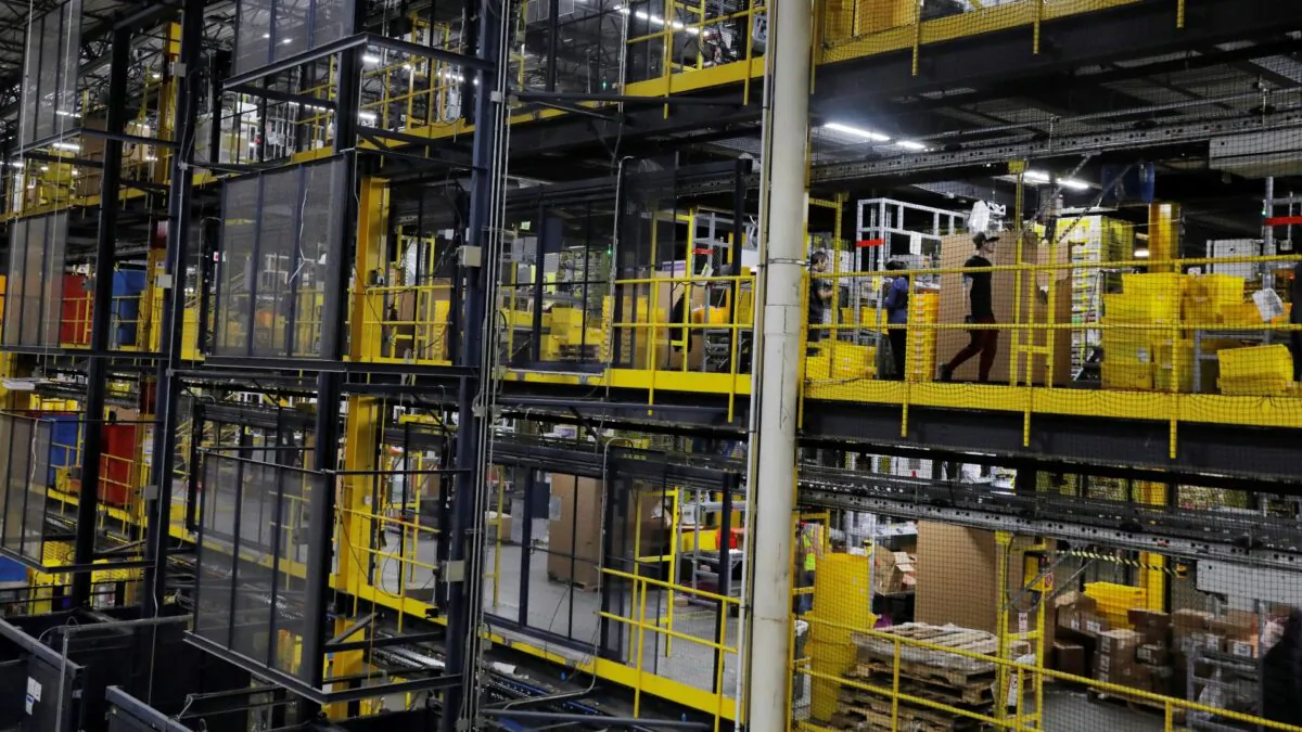 Amazon workers perform their jobs inside of an Amazon fulfillment center on Cyber Monday in Robbinsville, N.J., on Dec. 2, 2019. (Lucas Jackson/Reuters)