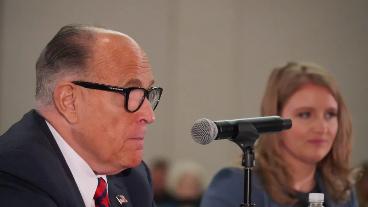President Donald Trump's lawyer Rudy Giuliani (L), with Trump campaign lawyer Jenna Ellis, testifies during a public hearing on election integrity in Phoenix, Ariz., on Nov. 30, 2020. (Mei Lee/The Epoch Times)