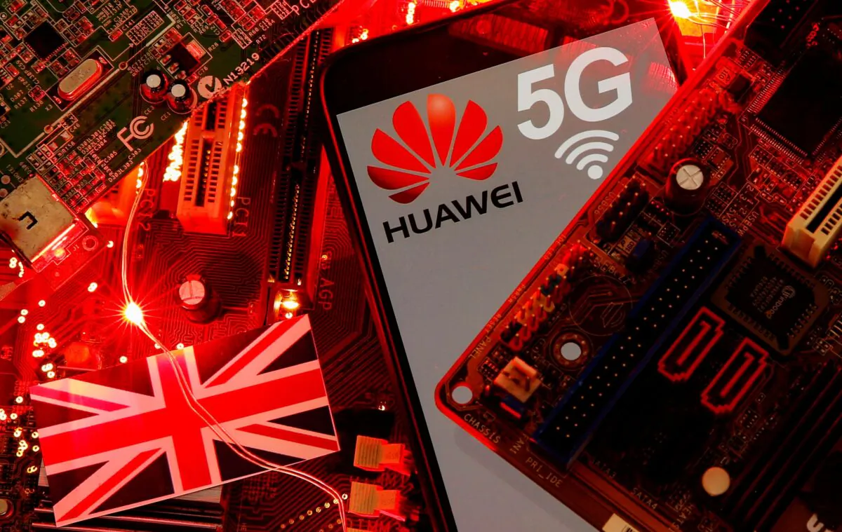 The British flag and a smartphone with a Huawei and 5G network logo are seen on a PC motherboard in this illustration picture taken on Jan. 29, 2020. (Dado Ruvic/Illustration/File Photo/Reuters)