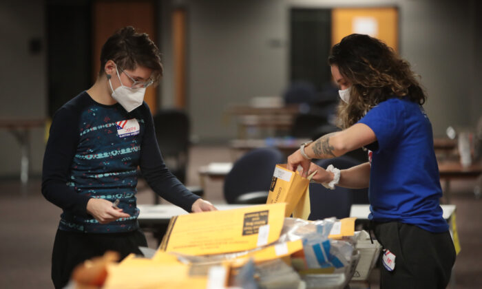 Election officials count absentee ballots in Milwaukee, Wis. on Nov. 4, 2020. (Scott Olson/Getty Images)