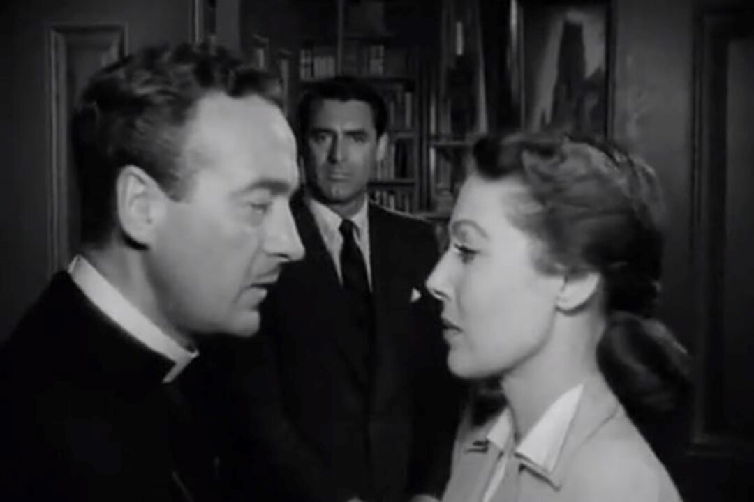 (Foreground) Bishop Brougham (David Niven, L) and his wife (Loretta Young) discuss the day’s plans while (background) Dudley (Cary Grant) eavesdrops. (RKO Radio Pictures).
