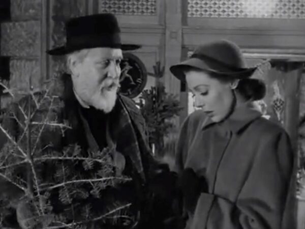 old man and beautiful lady and fir tree