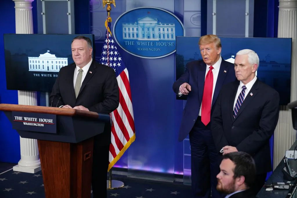 Then-President Donald Trump (C), then- Secretary of State Mike Pompeo (L), and then-Vice President Mike Pence, take a question during the daily briefing on the novel coronavirus at the White House in Washington on April 8, 2020. (Mandel Ngan/AFP via Getty Images)