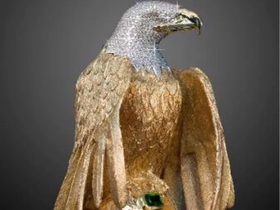 A golden eagle sculpture is shown in a handout photo from Delta Police. A legal battle over a missing diamond-encrusted eagle statue valued at nearly $1 million will continue, more than four years after the artwork was allegedly stolen during a robbery in Delta, British Columbia. (The Canadian Press/HO-Delta Police Mandatory Credit)