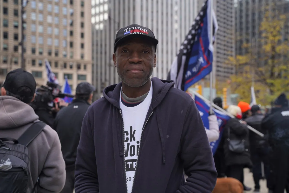 Ron Milner attends a Stop the Steal rally in Chicago on Nov. 26, 2020. (Cara Ding/The Epoch Times)