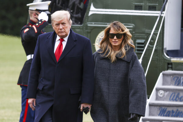 President Donald Trump and First Lady Melania Trump depart Marine One on the South Lawn of the White House in Washington, on Dec. 31, 2020. (Tasos Katopodis/Getty Images)