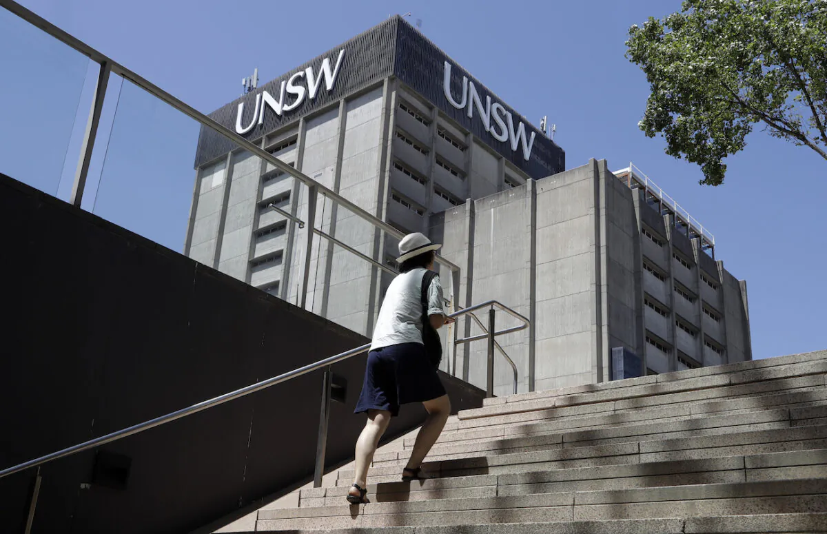A student walks around the University of New South Wales campus in Sydney, Australia, on Dec. 1, 2020. (AP Photo/Mark Baker)
