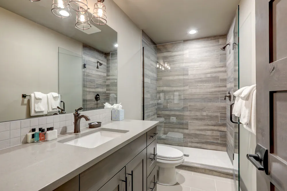 Be diligent about running kitchen and bathroom vent fans when those rooms are being used. (Artazum/Shutterstock)