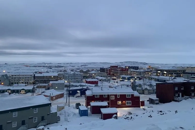 Downtown Iqaluit, Nunavut, is shown after 2 p.m. sunset on Nov. 24, 2020. (The Canadian Press/Emma Tranter)