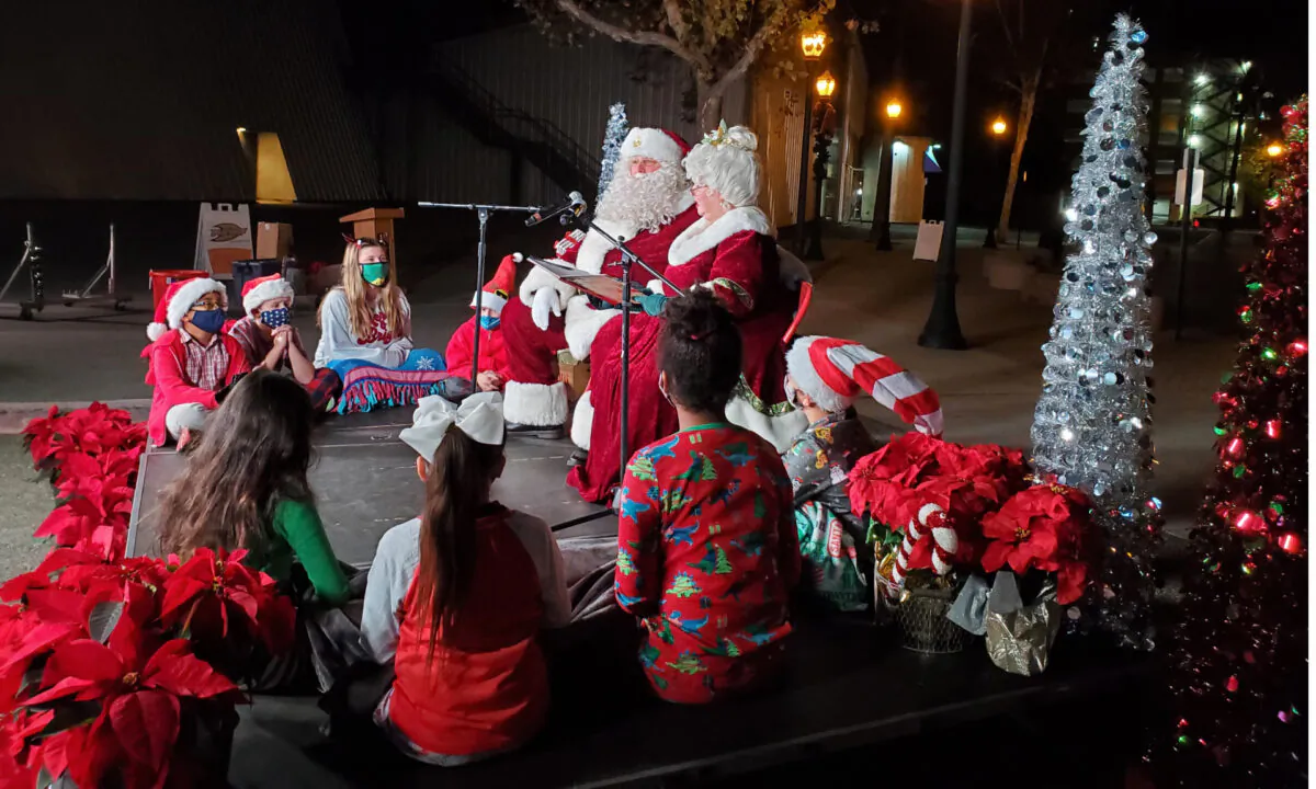 Santa and Mrs. Claus read a story to children as part of the annual Nutcracker Christmas Tree Lighting ceremony in Anaheim, Calif., on Dec. 3, 2020. (Courtesy of the City of Anaheim)