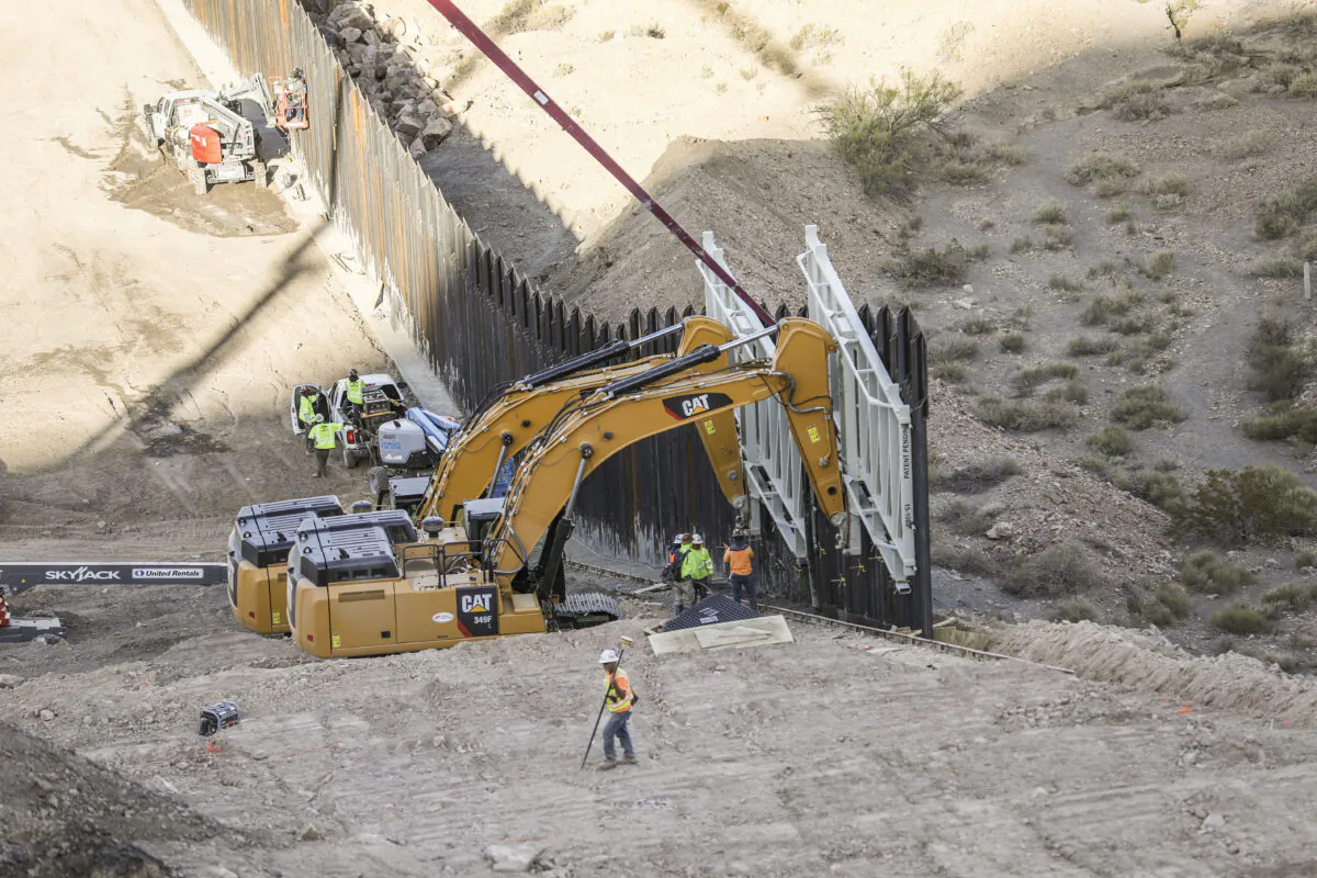 File photo showing construction of a section of border wall at Sunland Park, N.M., on May 30, 2019. (Charlotte Cuthbertson/The Epoch Times)