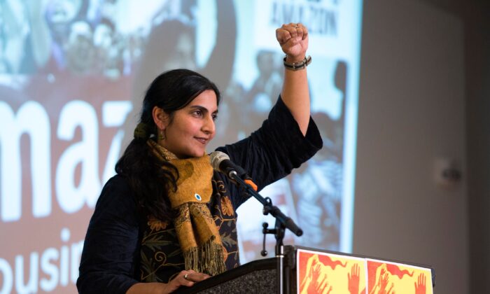 Seattle City Councilmember Kshama Sawant addresses supporters during her inauguration and "Tax Amazon 2020 Kickoff" event in Seattle, Wash., on Jan. 13, 2020. (Jason Redmond/AFP via Getty Images)