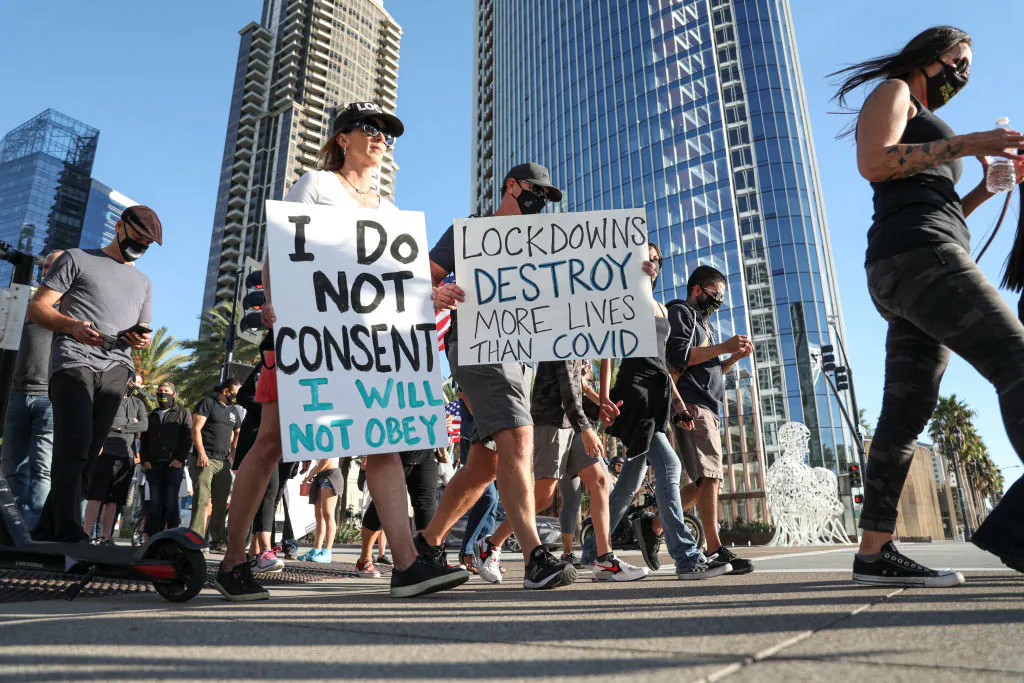 Business owners and others protest new COVID-19 regulations at the County Administration Building in San Diego, Calif., on Nov. 16, 2020. (Sandy Huffaker/Getty Images)