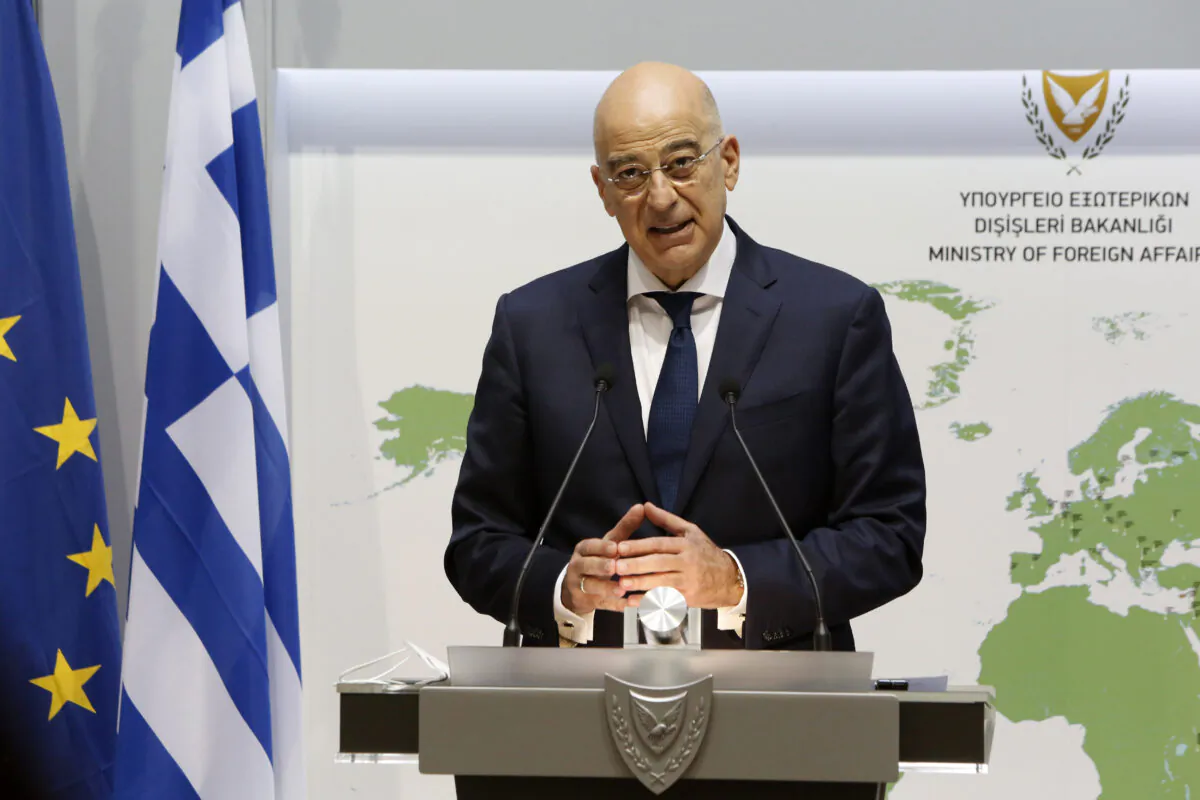 Greek Foreign Minister Nikos Dendias addresses a press conference with his Cypriot counterpart following their meeting in Nicosia, Greece, on Dec. 4, 2020. (Petros Karadjias/POOL/AFP via Getty Images)