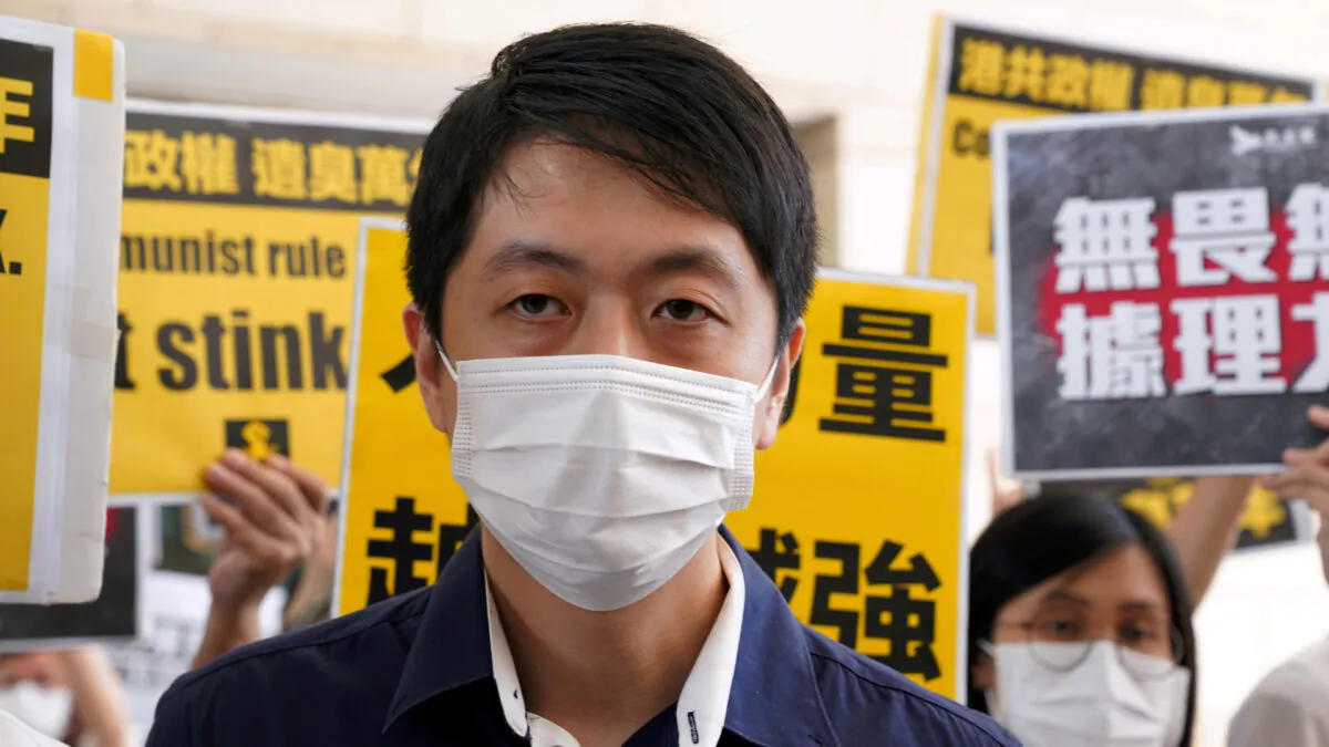 Former pro-democracy lawmaker Ted Hui Chi-Fung appears outside West Kowloon Magistrates' Courts in Hong Kong, China Nov. 19, 2020. (Lam Yik/Reuters)
