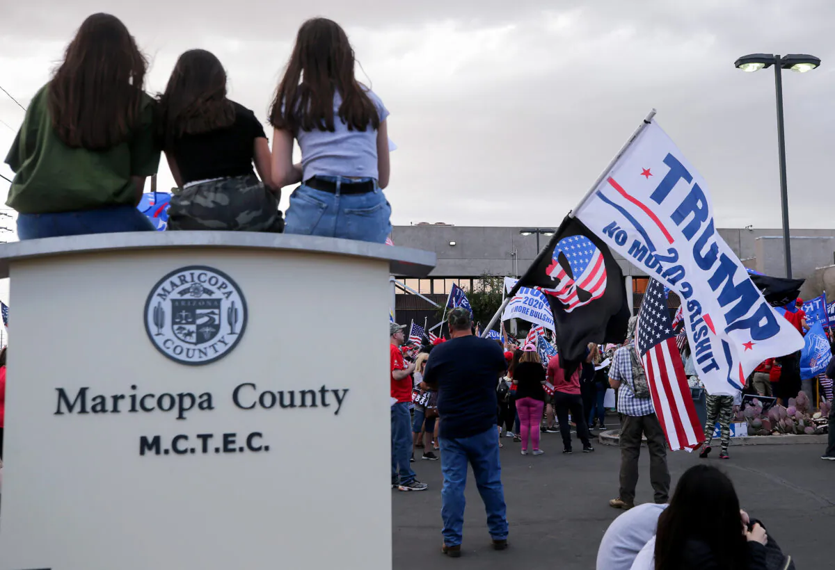 Supporters of President Donald Trump demonstrate at a ‘Stop the Steal’ rally in front of the Maricopa County Elections Department office in Phoenix, Ariz., on Nov. 7, 2020. (Mario Tama/Getty Images)