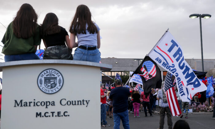 Supporters of President Donald Trump demonstrate at a ‘Stop the Steal’ rally in front of the Maricopa County Elections Department office in Phoenix, Ariz., on Nov. 7, 2020. (Mario Tama/Getty Images)