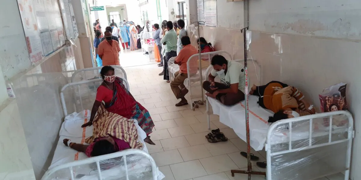 Patients and bystanders at the district government hospital in Eluru, Andhra Pradesh state, India, on Dec. 6, 2020. (AP Photo)