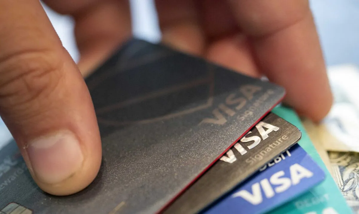 This Aug. 11, 2019, file photo shows Visa credit cards in New Orleans. (Jenny Kane/AP Photo)