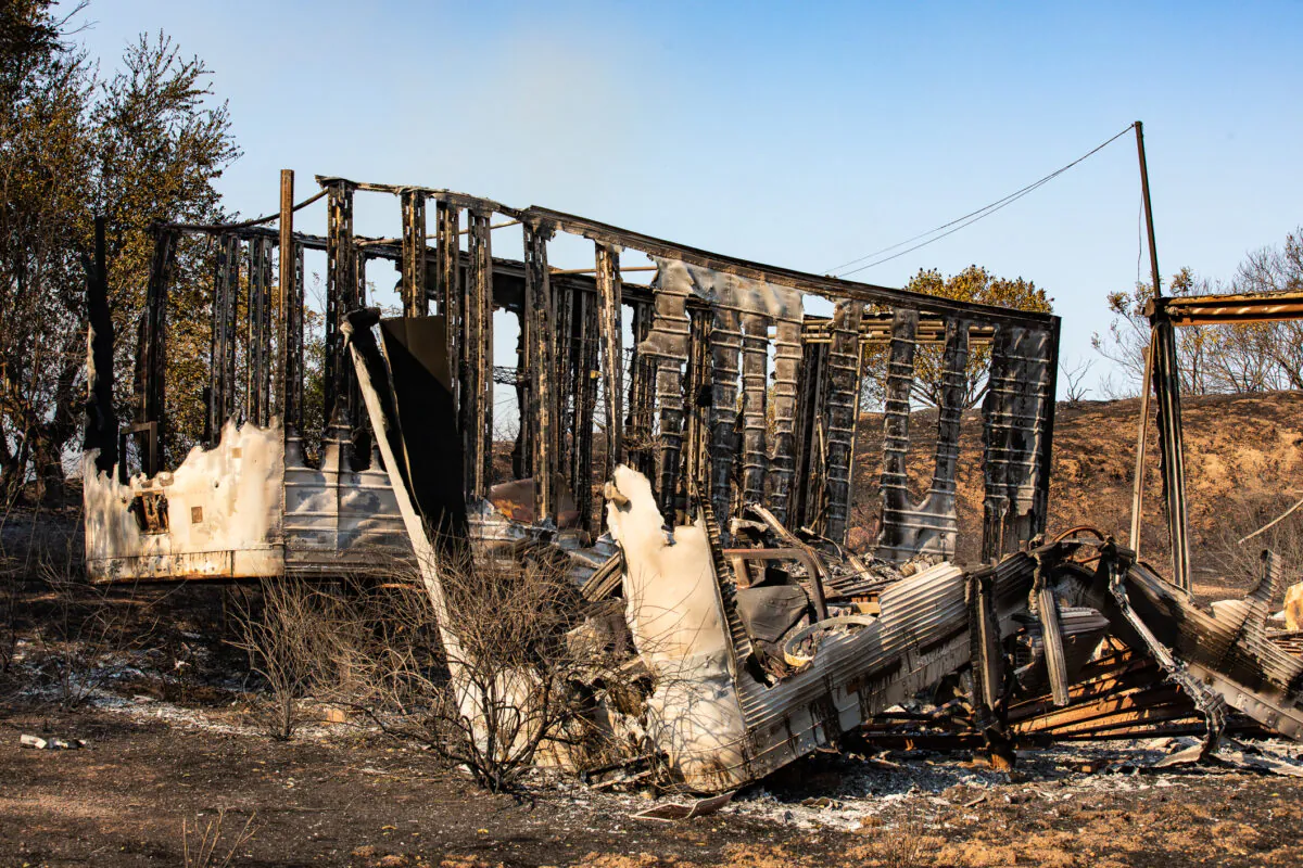 A structure lies in ruins following the Bond Fire in Silverado Canyon, Calif., on Dec. 3, 2020. (John Fredricks/The Epoch Times)