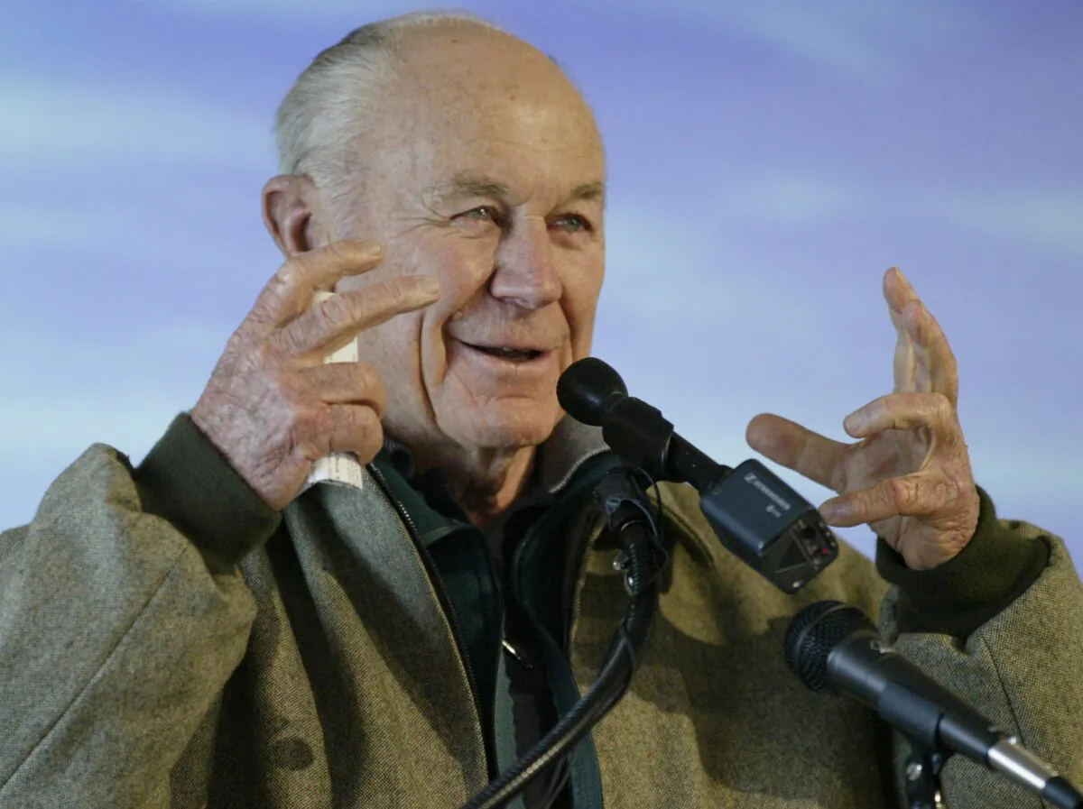 General Chuck Yeager, the first person to break the sound barrier, speaks to a crowd Dec. 16, 2003 during the weeklong First Flight Centennial Celebration that is taking place at the Wright Brothers National Memorial in Kill Devil Hills, North Carolina. (Ellen Ozier ELO/GAC/Files/Reuters)