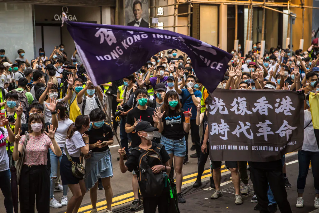 Protesters chant slogans during a rally against a new national security law in Hong Kong on July 1, 2020. (Dale de la Rey/AFP via Getty Images)