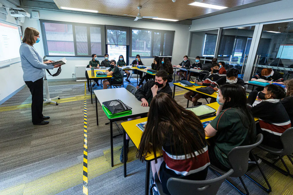 Yellow and black tape marks an area on the floor for teachers to be socially distanced from students in class at Melba Secondary College in Melbourne, Australia, on Oct. 12, 2020. (Daniel Pockett/Getty Images)