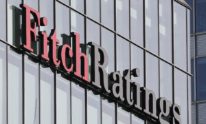 Fitch cautions that ongoing political division over debt ceiling could damage AAA credit rating.