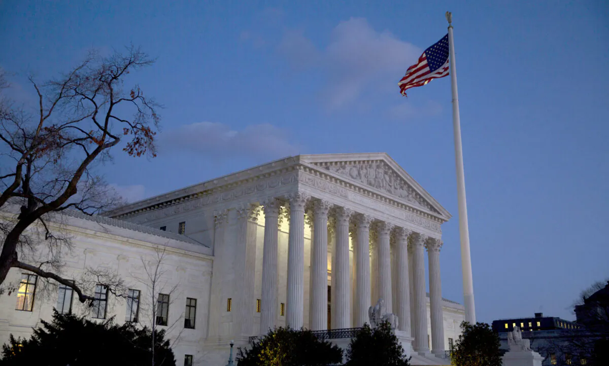 The American flag flies in front of the U.S. Supreme Court in Washington on Feb 13, 2016. (Drew Angerer/Getty Images)