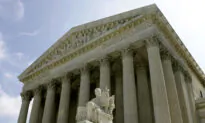 Biden Admin Asks Supreme Court to Cancel Asylum, Border Wall Arguments