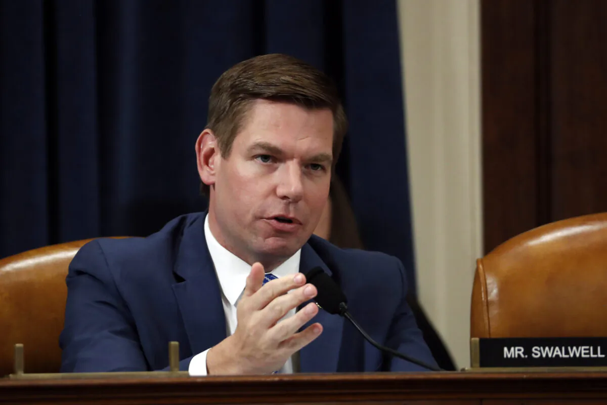 Rep. Eric Swalwell (D-Calif.) asks questions during the impeachment inquiry against President Donald Trump during a House Intelligence Committee hearing in Washington on Nov. 19, 2019. (Jacquelyn Martin/Pool/AFP via Getty Images)