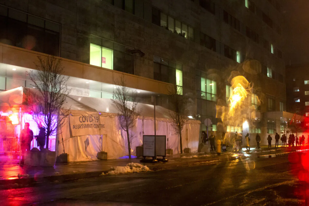 A queue forms outside a COVID-19 testing centre in Toronto, on Dec. 9, 2020. (The Canadian Press/Chris Young)