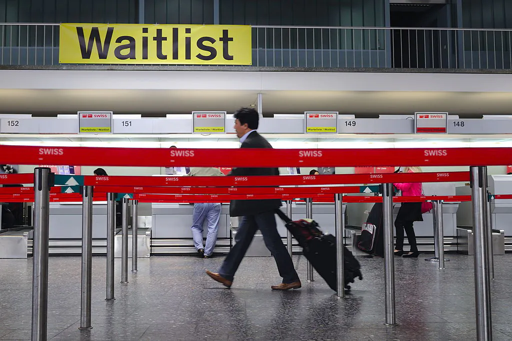 A passenger enters Zurich airport in Switzerland on April 20, 2010. (Fabrice Coffrini/AFP via Getty Images)