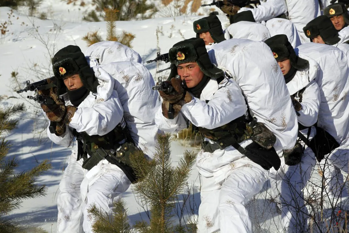 Chinese soldiers take part in a winter training session in Heihe, northeast China's Heilongjiang province, on Jan. 28, 2015. (STR/AFP via Getty Images)