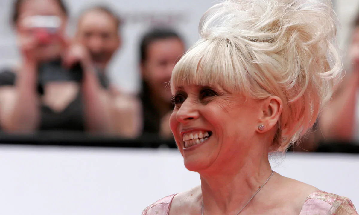 Fans photograph actress Barbara Windsor as she arrives for the British Academy Television Awards at the Palladium theatre in London, on May 20, 2007. (Luke MacGregor/Reuters)