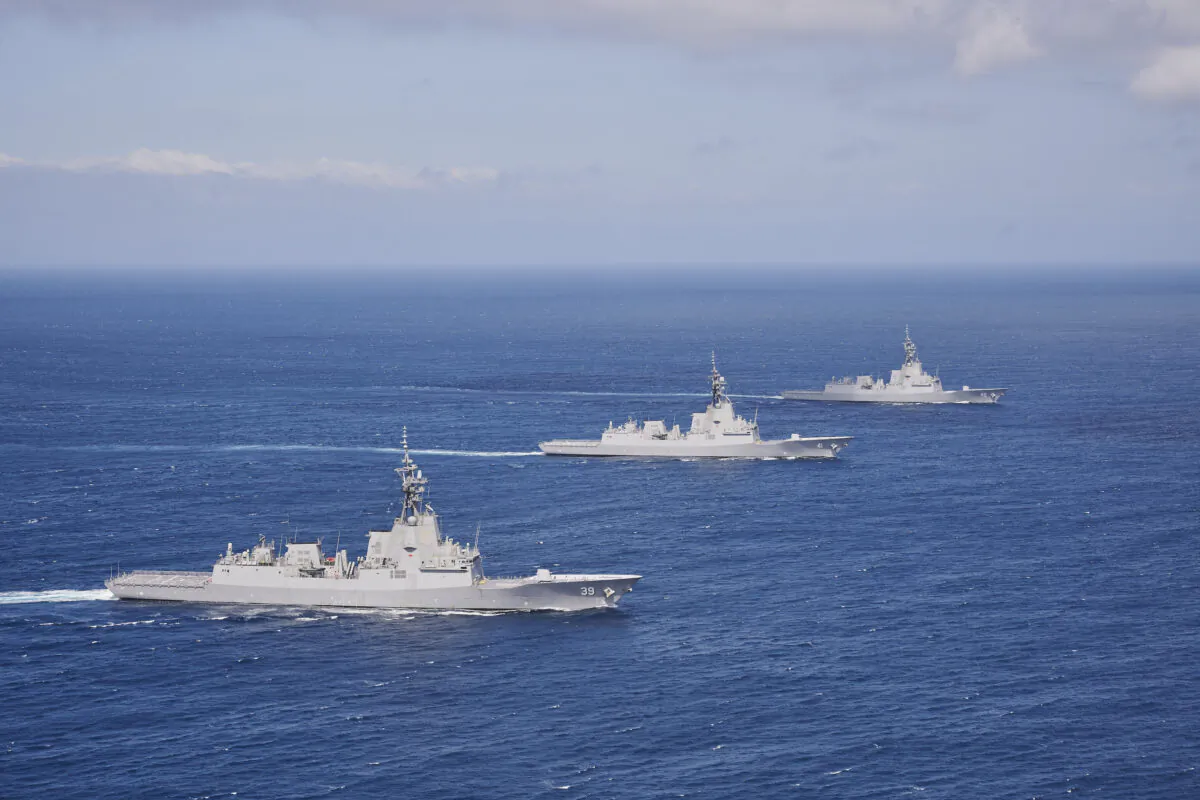 HMA Ships Hobart, Brisbane and Sydney sail in formation through the the Eastern Australian Exercise Area off the coast of New South Wales. (Peter Beeh/ADF)