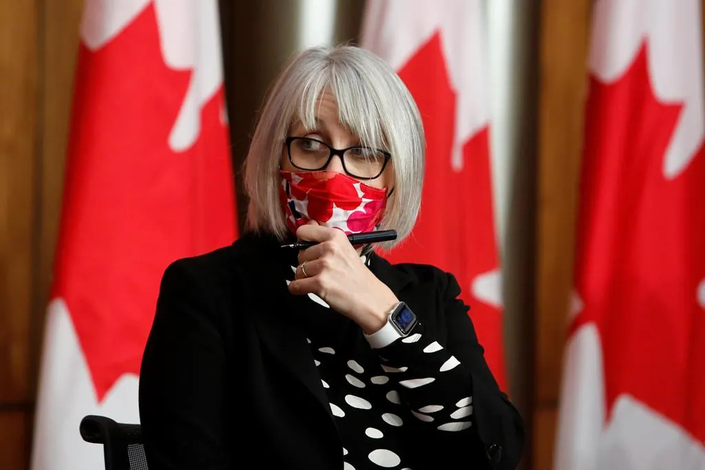 Health Minister Patty Hajdu arrives at a COVID-19 press conference in Ottawa, onDec. 11, 2020. (The Canadian Press/David Kawai)
